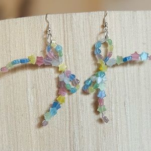 Dainty, hand-beaded bow earrings on French wire for pierced ears. Multi-color.